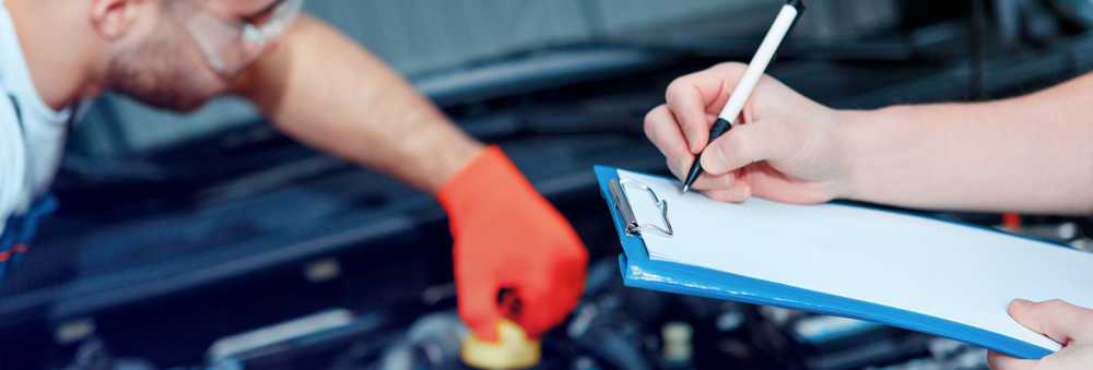 Mechanics doing an MOT test - MOT Fenland