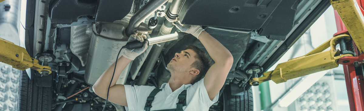 Mechanics servicing a vehicle - Car Servicing Fenland